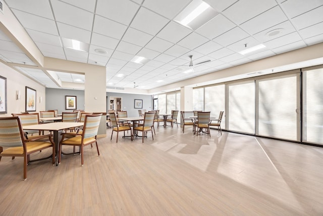 6615 Lake Shore Dr S Unit 311, Richfield, MN 55423 - dining area with a drop ceiling and wood finished floors