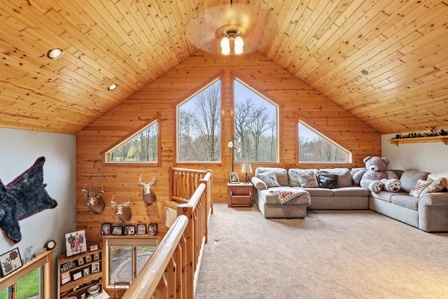 carpeted living room with wood ceiling, wood walls, and vaulted ceiling