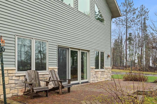 back of house with a patio