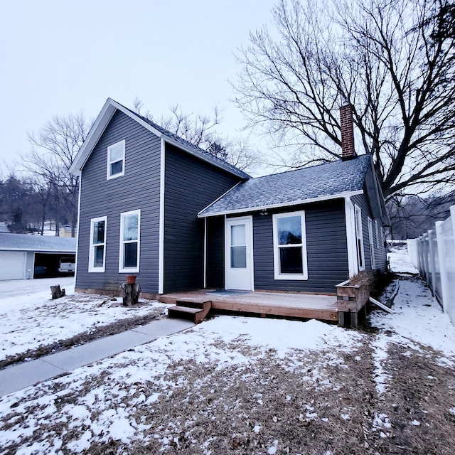 view of front facade with a wooden deck