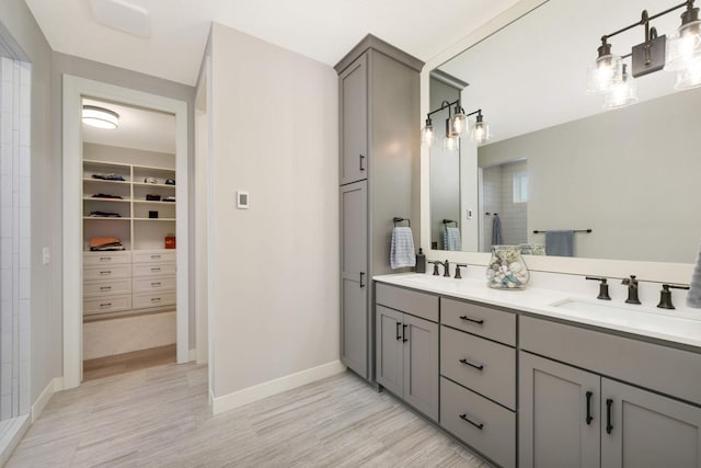 bathroom featuring vanity and wood-type flooring