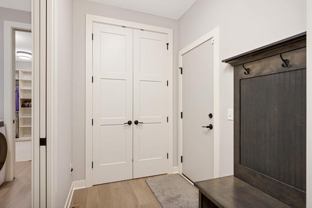 mudroom with light wood-type flooring