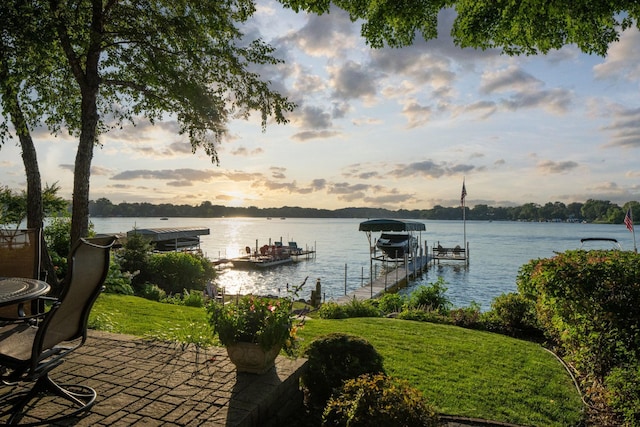 view of dock featuring a water view and boat lift