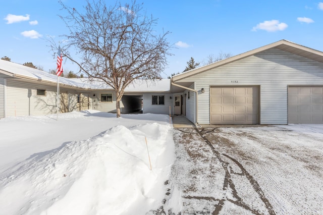 single story home featuring a garage