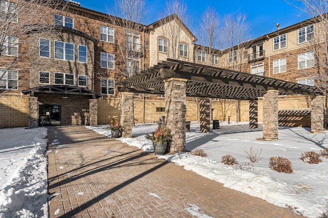 exterior space featuring a pergola