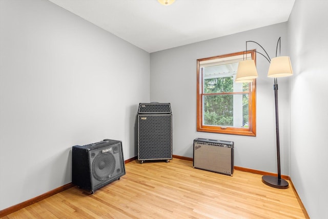 8224 Morris Rd, Bloomington, MN 55437 - miscellaneous room featuring wood finished floors and baseboards