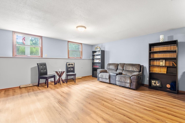 8224 Morris Rd, Bloomington, MN 55437 - sitting room with wood finished floors and a textured ceiling