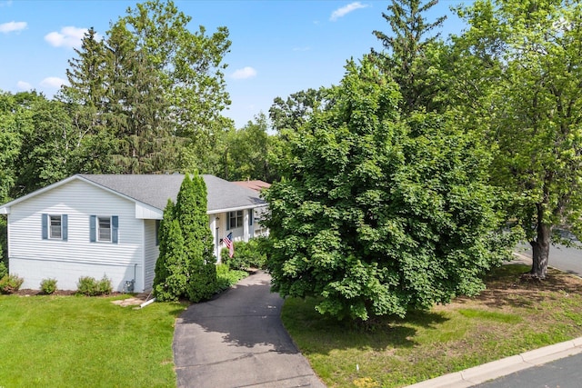 8224 Morris Rd, Bloomington, MN 55437 - view of front of home featuring a front yard, driveway, and roof with shingles