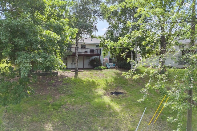 8224 Morris Rd, Bloomington, MN 55437 - view of grassy yard featuring a deck