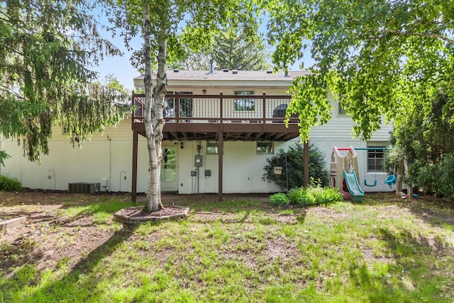 8224 Morris Rd, Bloomington, MN 55437 - rear view of house featuring a wooden deck and a playground