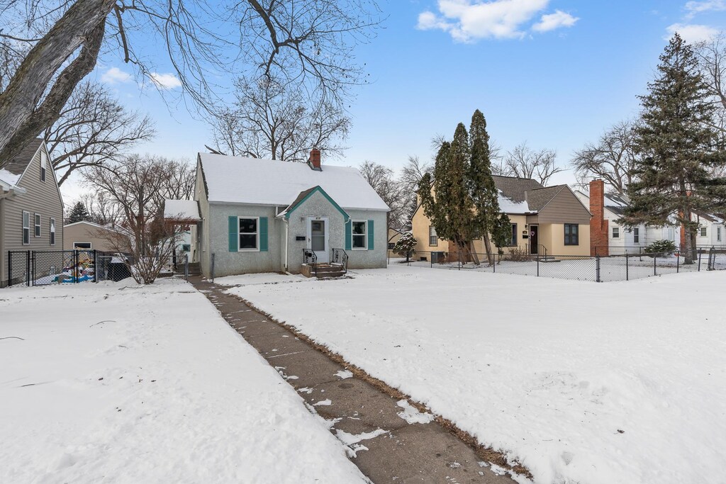 815 Ashland Ave, Saint Paul Park, MN 55071 - view of snow covered rear of property