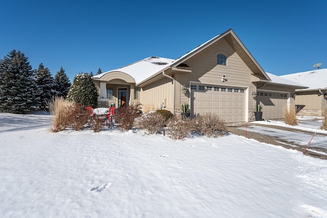 single story home featuring an attached garage