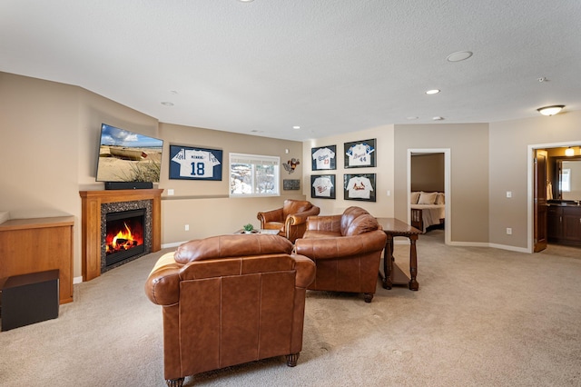 17365 Hanson Ct, Eden Prairie, MN 55347 - living room with light carpet, a tiled fireplace, baseboards, recessed lighting, and a textured ceiling