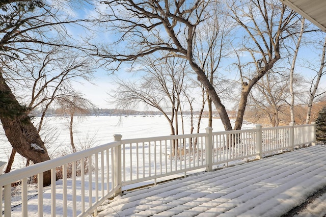 view of snow covered deck