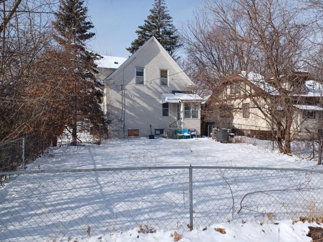 view of snow covered property