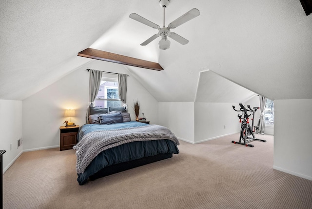 bedroom with a textured ceiling, baseboards, and light colored carpet