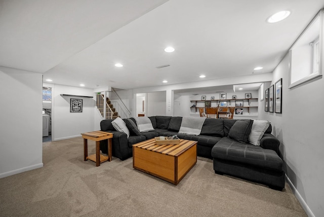 living room with stairs, light carpet, baseboards, and recessed lighting