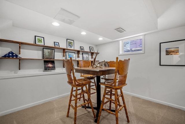 dining area featuring light carpet, recessed lighting, visible vents, and baseboards