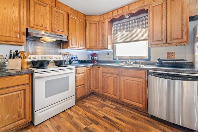 kitchen with dark hardwood / wood-style floors, stainless steel dishwasher, white electric stove, and sink