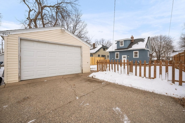 view of snow covered garage