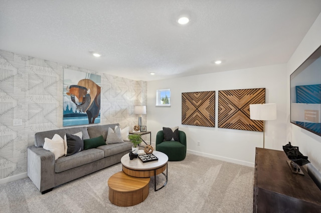 living room with light carpet and a textured ceiling