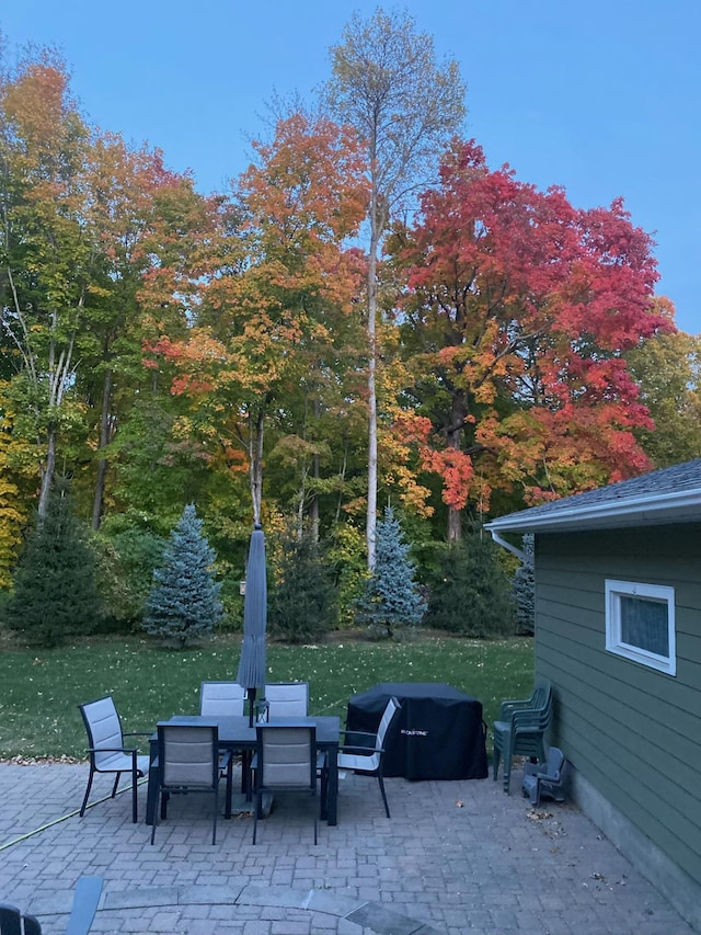 view of patio featuring a grill