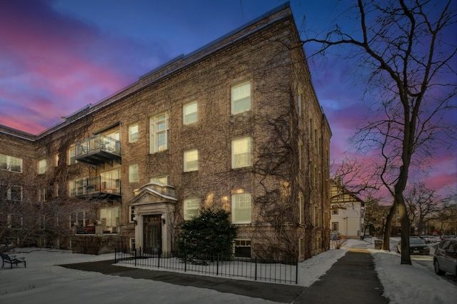 view of property at dusk