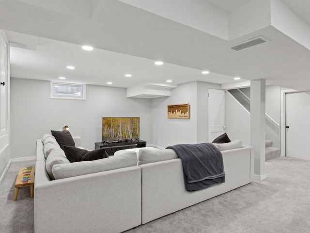 living room with stairway, light carpet, baseboards, visible vents, and recessed lighting