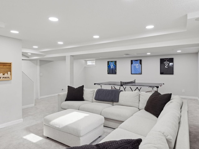 living room with baseboards, recessed lighting, and light carpet