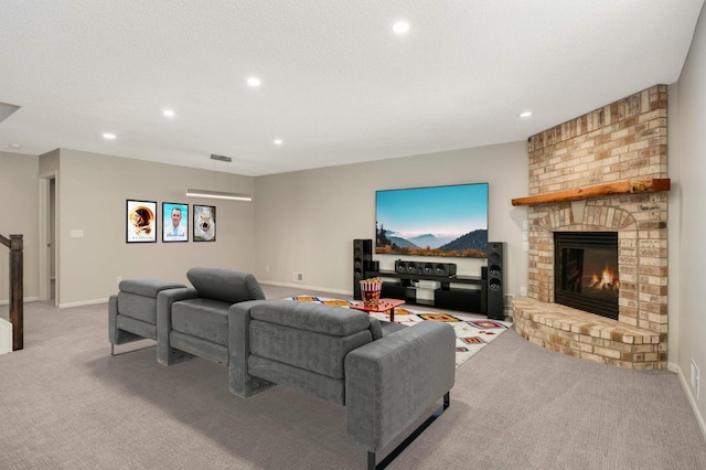 living room featuring recessed lighting, a brick fireplace, baseboards, and carpet floors