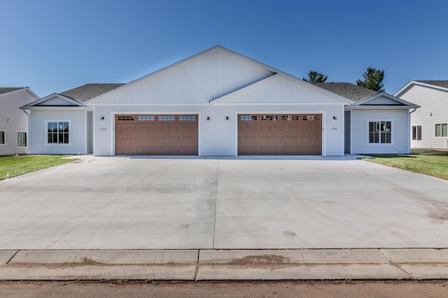 ranch-style house featuring a garage