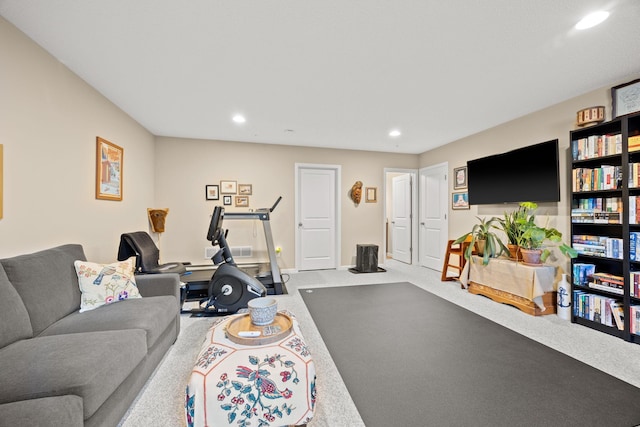 living area featuring recessed lighting, baseboards, and carpet floors