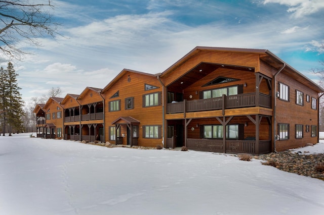 view of snow covered property