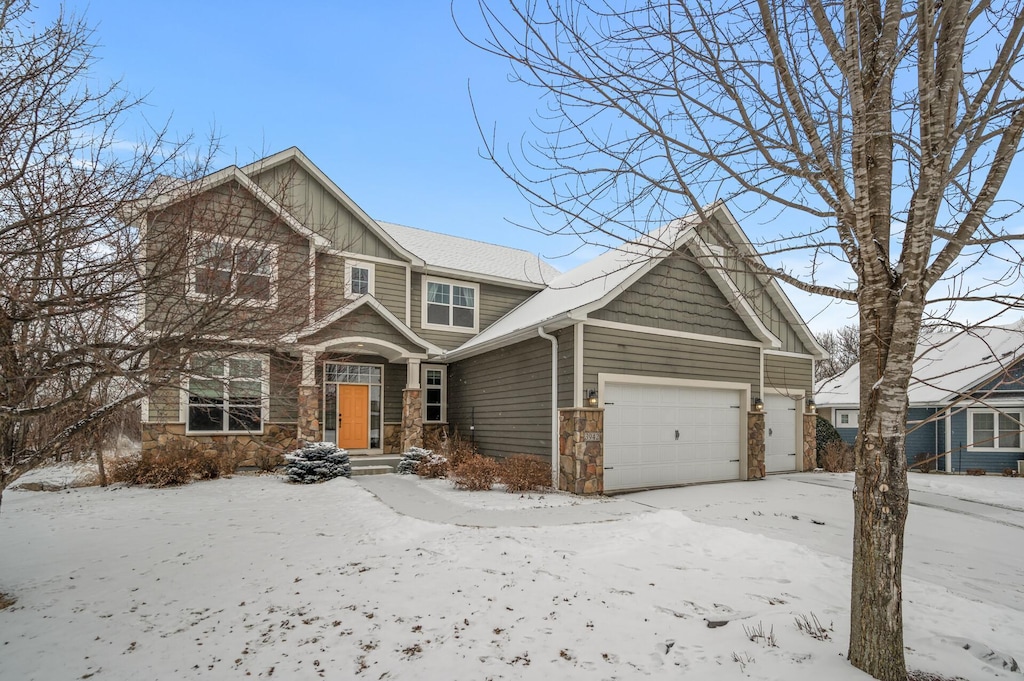 craftsman-style home with a garage