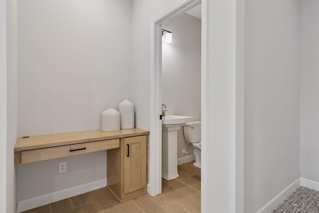 17953 Hidden Creek Trl, Lakeville, MN 55044 - bathroom featuring wood finished floors and baseboards