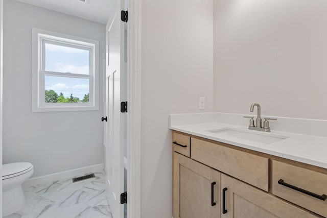 17953 Hidden Creek Trl, Lakeville, MN 55044 - bathroom featuring vanity and marble look tile flooring