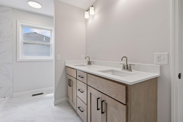 17953 Hidden Creek Trl, Lakeville, MN 55044 - bathroom featuring double vanity and marble finish flooring