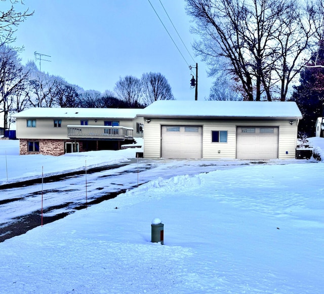 view of snow covered garage