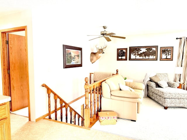 living room featuring ceiling fan