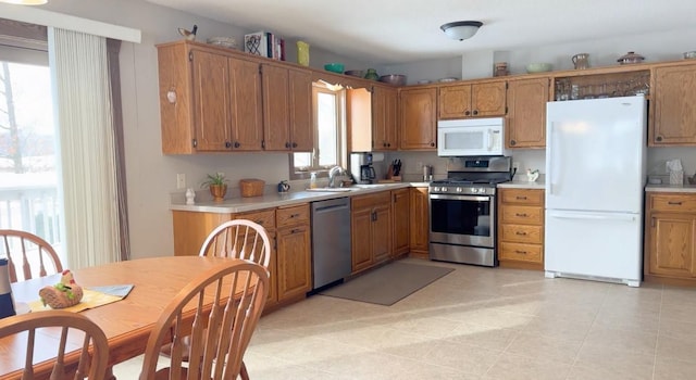 kitchen featuring appliances with stainless steel finishes and sink