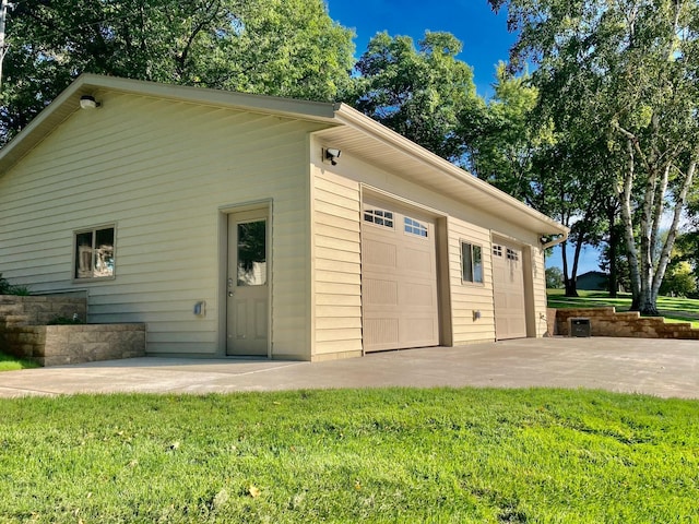 garage with a lawn