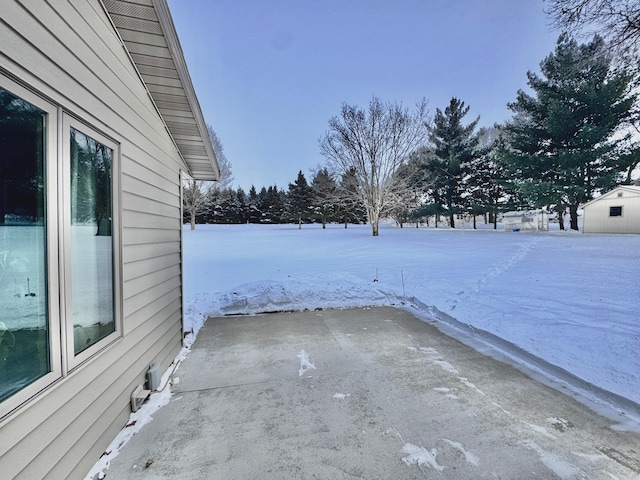 view of yard covered in snow