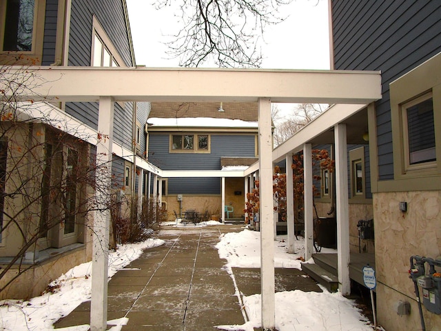 view of snow covered patio