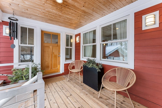 wooden terrace with a porch