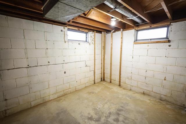 basement featuring plenty of natural light