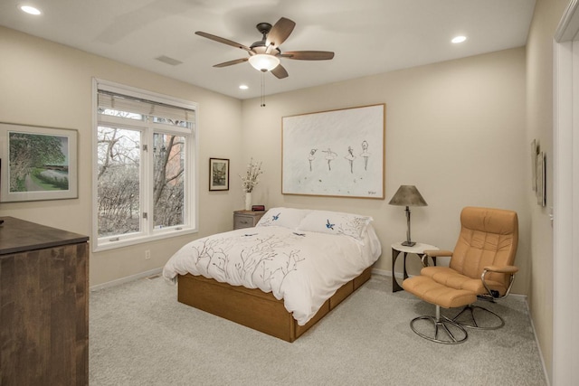 carpeted bedroom featuring recessed lighting, a ceiling fan, and baseboards