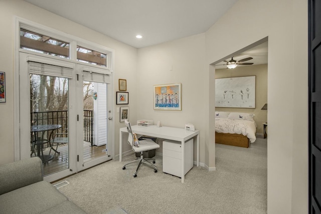 carpeted office space featuring visible vents, recessed lighting, and baseboards