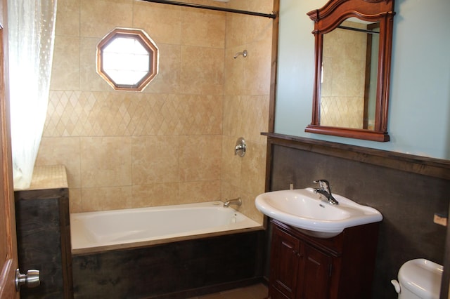 full bathroom featuring vanity, shower / tub combo with curtain, and toilet