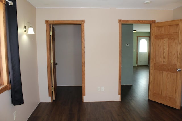 interior space with dark wood-type flooring