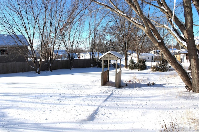 view of yard covered in snow